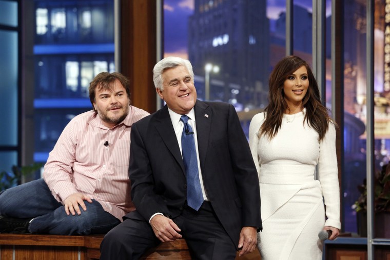 Image: Jay Leno sits with guests Jack Black and Kim Kardashian on his final night hosting \"The Tonight Show with Jay Leno\" in Burbank, California