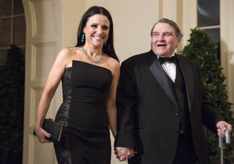 Image: Actress Julia Louis-Dreyfus and her father Gerard Louis-Dreyfus arrive for the State Dinner being held for French President Francois Hollande at the White House in Washington