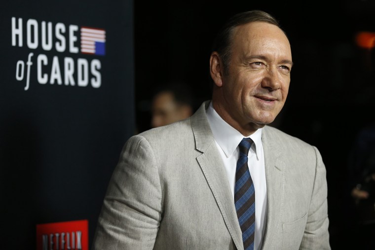Image: Cast member Spacey poses at the premiere for the second season of the television series \"House of Cards\" at the Directors Guild of America in Los Angeles