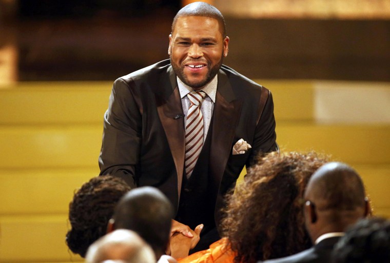Image: Anthony Anderson talks with Oprah Winfrey during the 45th NAACP Image Awards in Pasadena