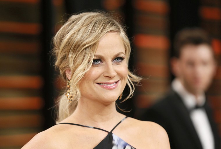 Image: Poehler arrives at the 2014 Vanity Fair Oscars Party in West Hollywood