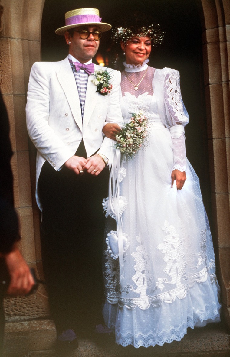 (dpa) - British pop musician Elton John and his newly wed wife, German sound technician Renate Blauel, pictured after their wedding in Sydney, 14 February 1984. Photo by: Hinze/picture-alliance/dpa/AP Images