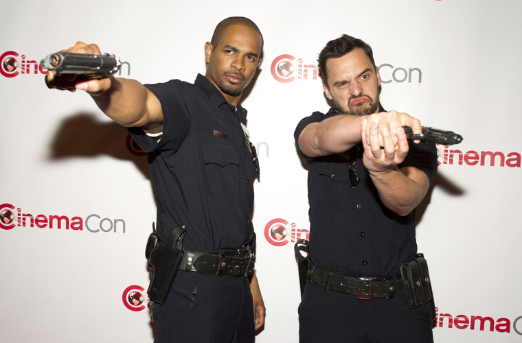 Image: Actors Damon Wayans Jr. and Jake Johnson arrive for a 20th Century Fox presentation during CinemaCon, the official convention of the National Association of Theatre Owners, at Caesars Palace in Las Vegas
