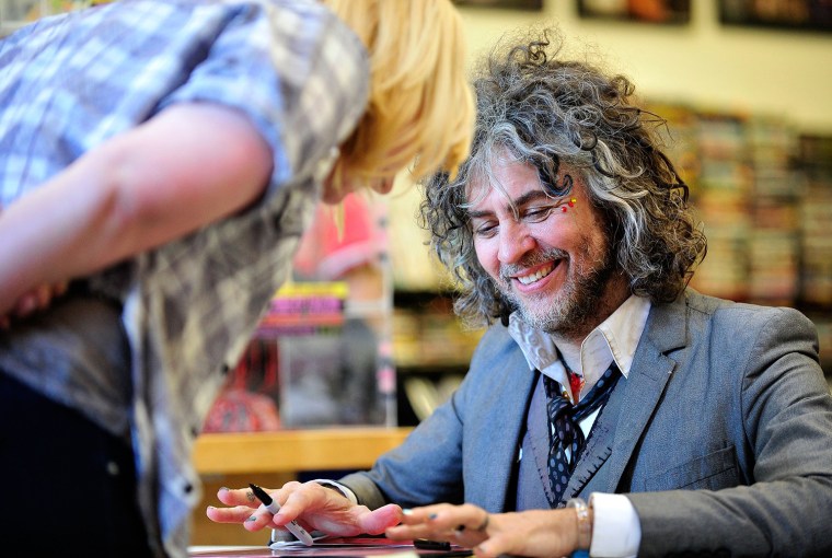 Image: Wayne Coyne Signs Copies of \"The Flaming Lips 1st EP\" Limited Edition Reissue At Fingerprints