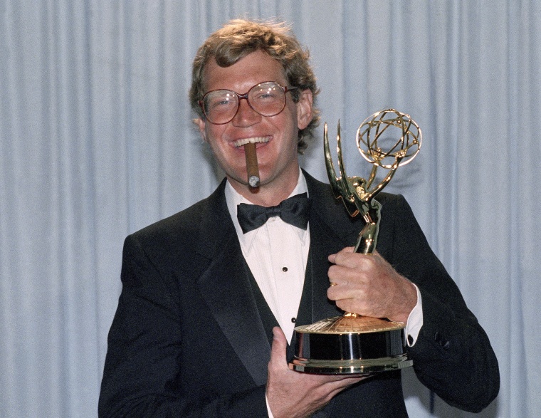 Comedian David Letterman holds his award at the 37th Annual Primetime Emmy Awards ceremony in Pasadena, Ca., Sunday, Sept. 22, 1985. (AP Photo/Nick Ut)