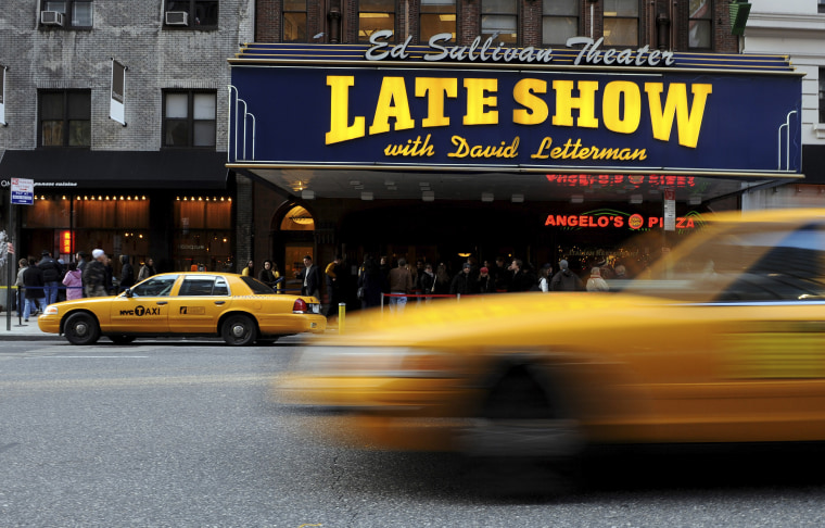 Ticket holders wait in line to enter the Ed Sullivan Theatre to watch the first episode of the \"Late Show with David Letterman\" to air since Letterman's production company struck a deal to allow writers to come back to work, Wednesday, Jan. 2, 2008, in New York. (AP Photo/Peter Kramer)