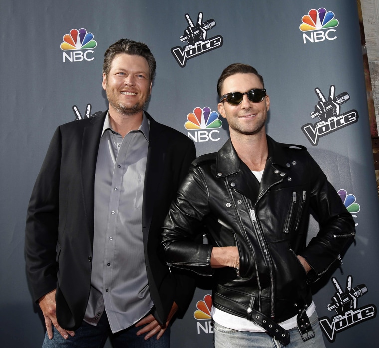 Image: Celebrity coaches Shelton and Levine pose at a media event for the television show \"The Voice\" in Hollywood