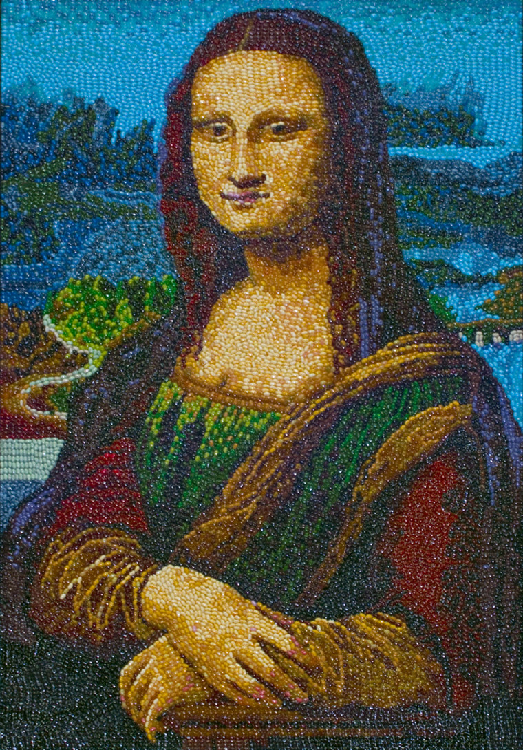 Made completely from Jelly Belly jelly beans, artist Kristen Cumings recreated Leonardo Da Vinci's masterpiece with a sweet twist. The Jelly Belly Mona Lisa is reflective of what art historians believe the original colors may have looked like before almost 600 years of wear and tear.
