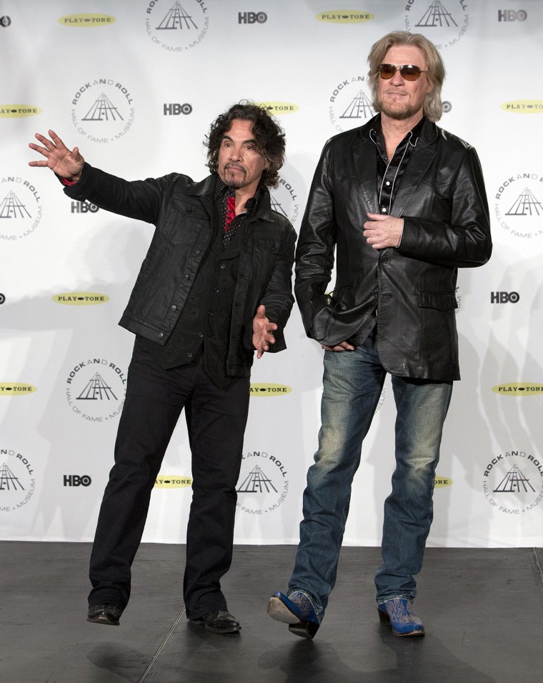 Image: Oates and Hall of band Hall and Oates stand together after rock band was inducted at 29th annual Rock and Roll Hall of Fame Induction Ceremony in Brooklyn, New York