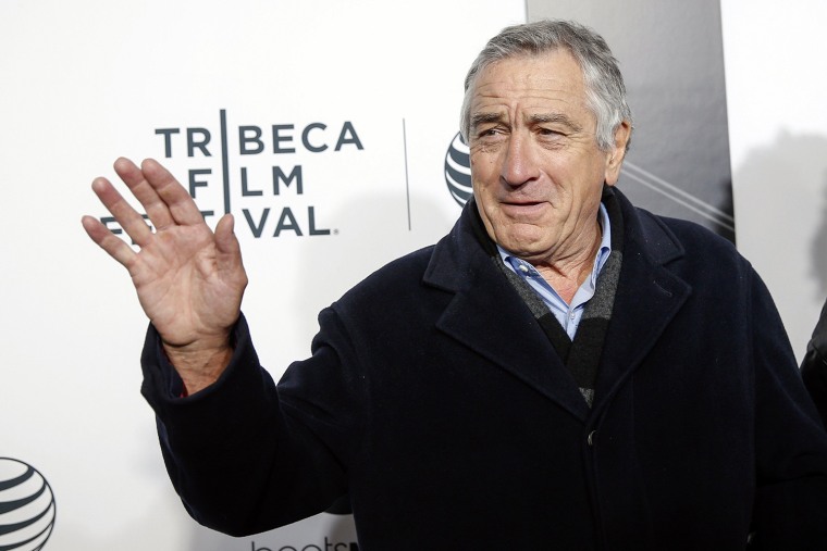 Image: Robert De Niro waves upon arriving for the 2014 Tribeca Film Festival opening night screening of 'Time Is Illmatic' in New York