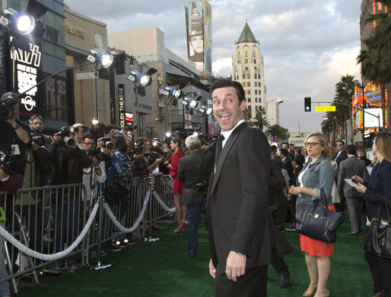Image: Cast member Hamm poses at the premiere of \"Million Dollar Arm\" at El Capitan theatre in Hollywood