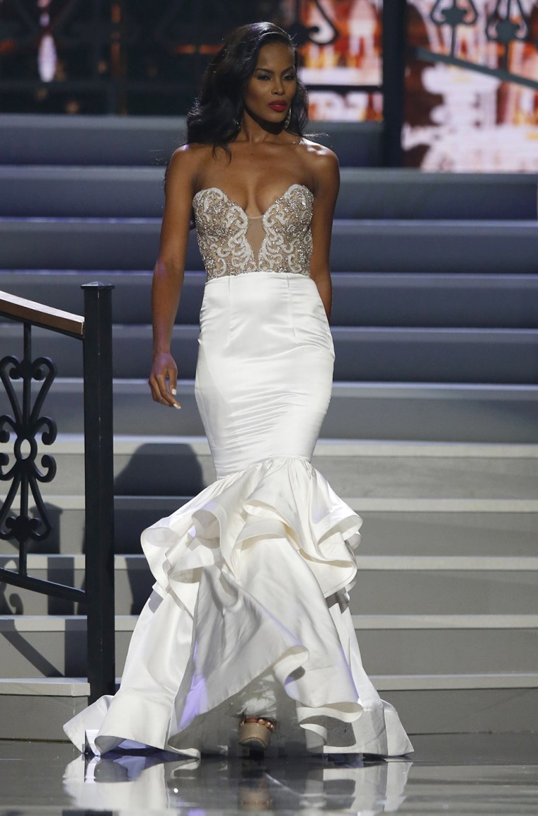 Image: Miss Georgia Tiana Griggs takes the runway during the evening gown portion of the 2014 Miss USA beauty pageant in Baton Rouge, Louisiana