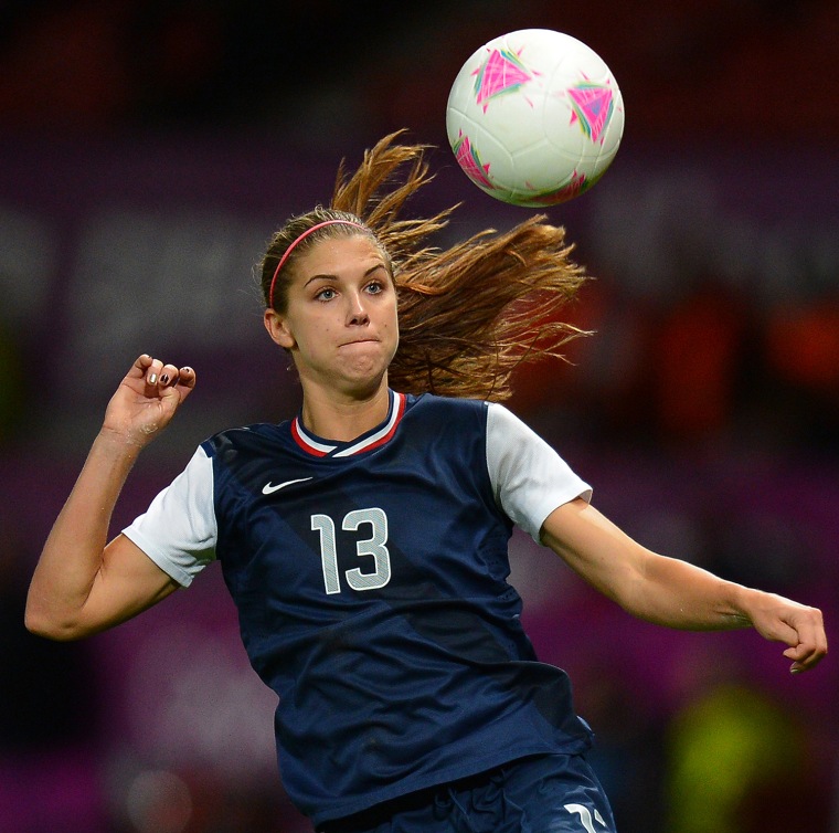 Image: US forward Alex Morgan controls the ball during the London 2012 Olympic Games womens semi final football match between the US and Canada.