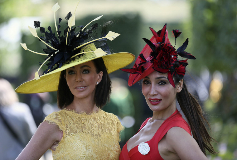 Image: Racegoers pose on the first day of the Royal Ascot horse racing festival at Ascot