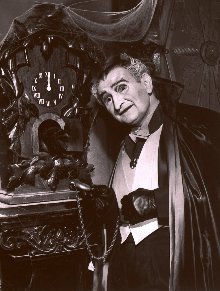 Actor Al Lewis, in character as Grandpa Munster from \"The Munsters\" television show, is seen in July 1964. Lewis, the cigar-chomping patriarch of \"The Munsters\" whose work as a basketball scout, restaurateur and political candidate never eclipsed his role as Grandpa Muster from the television sitcom, died Friday night, Feb. 3, 2006 after years of failing health. He was 82. (AP Photo)