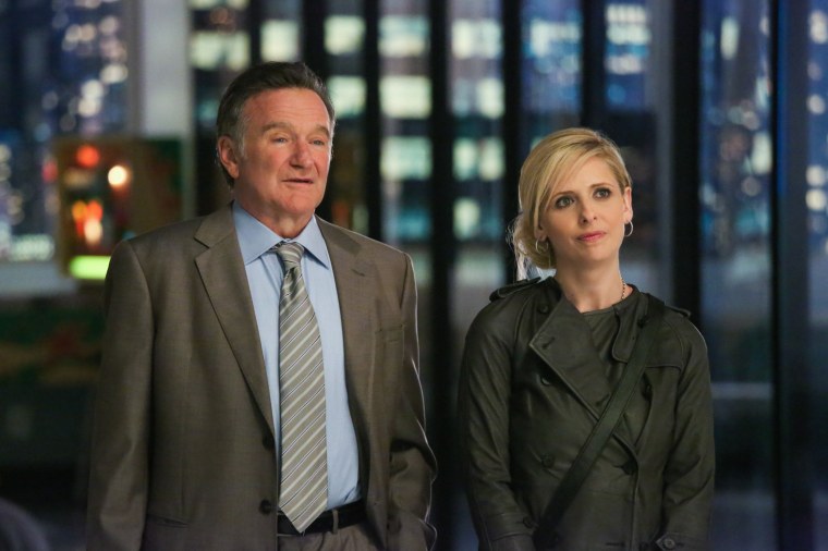 This publicity image released by CBS shows Robin Williams, left, and Sarah Michelle Gellar in a scene from the pilot episode of \"The Crazy Ones,\" a new CBS comedy premiering Thursday, Sept. 26 at 9 p.m. EST. (AP Photo/CBS, Richard Cartwright)