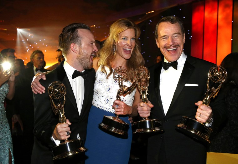 Image: Aaron Paul, Anna Gunn and Bryan Cranston attend the Governors Ball for the 66th Primetime Emmy Awards in Los Angeles