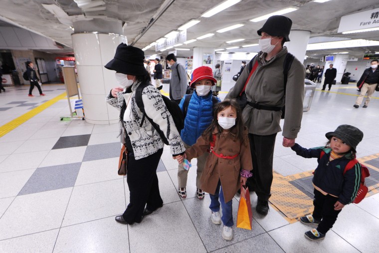 Image: Women and Children Leave Tokyo Over Radiation Concerns