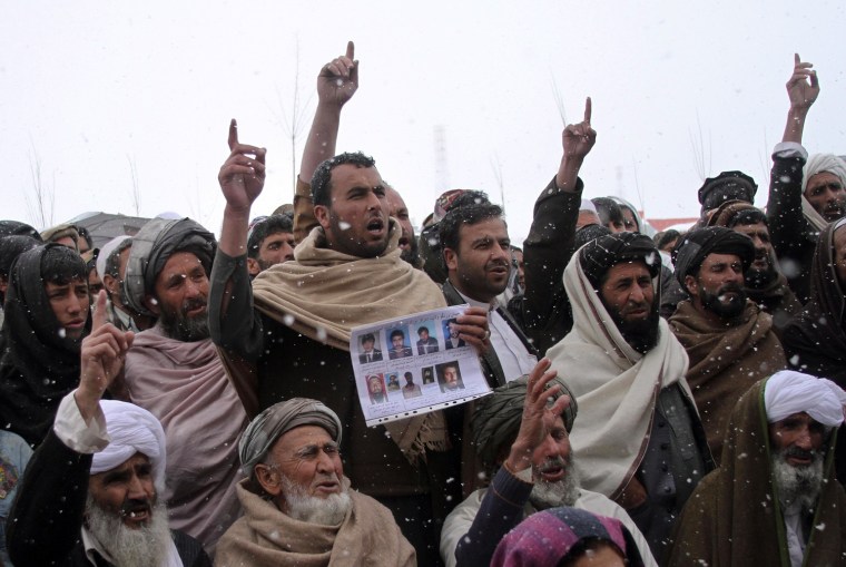 Image: Afghan villagers shout slogans during a protest against U.S. special forces accused of overseeing torture and killings in Wardak province