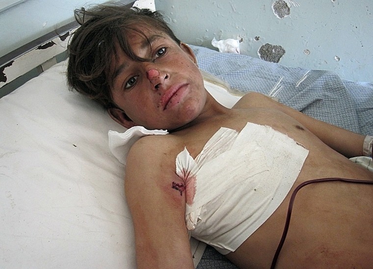 Image: AFGHANISTAN-UNREST-US-NATO-CIVILIAN-CHILDREN