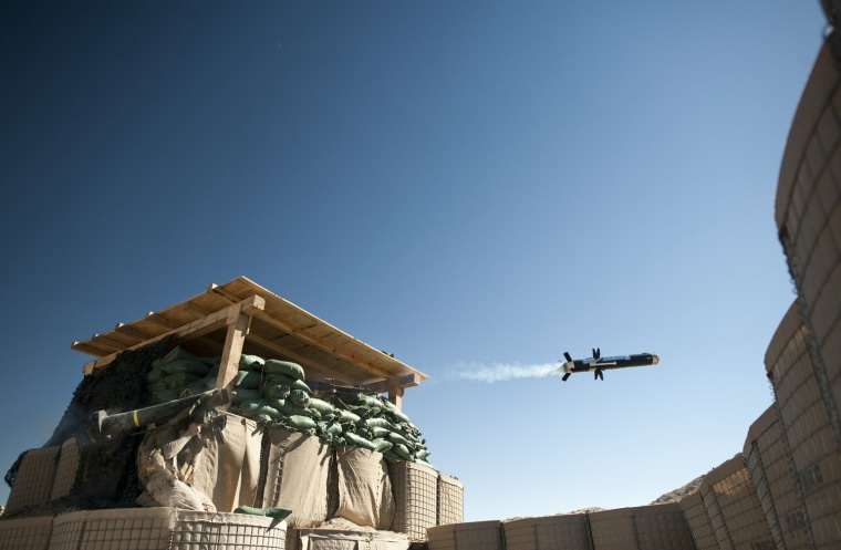 Image: A US Marine launches an anti-tank missile