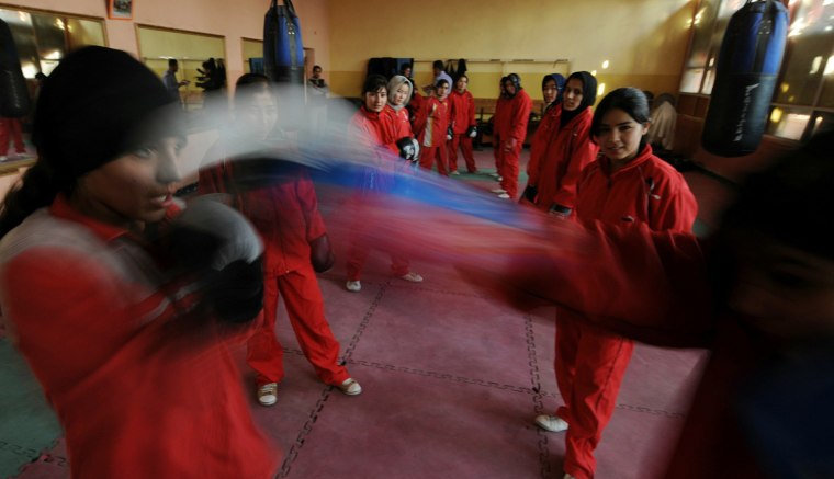 Image: Afghan girls practice during a boxing tr