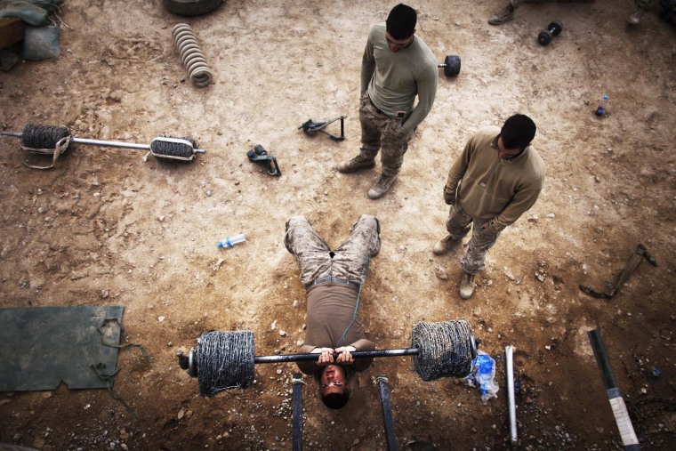 Image: U.S. Marine lifts weights in southern Afghanistan's Helmand province