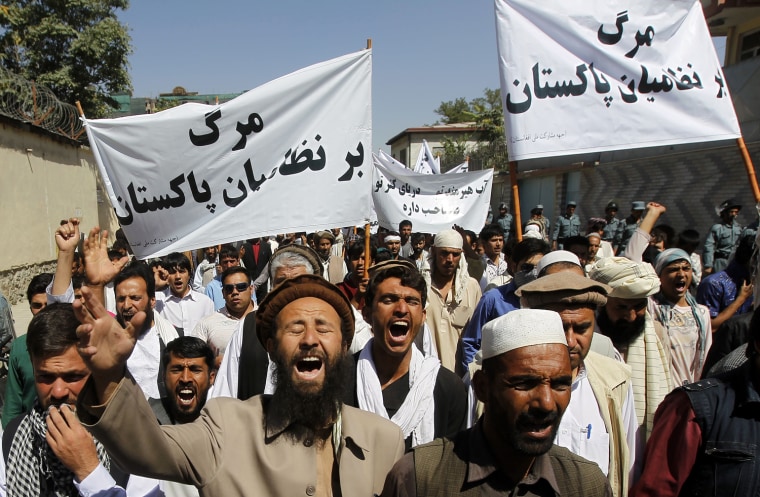 Image: Afghan men shout anti-Pakistan slogans during a demonstration in Kabul