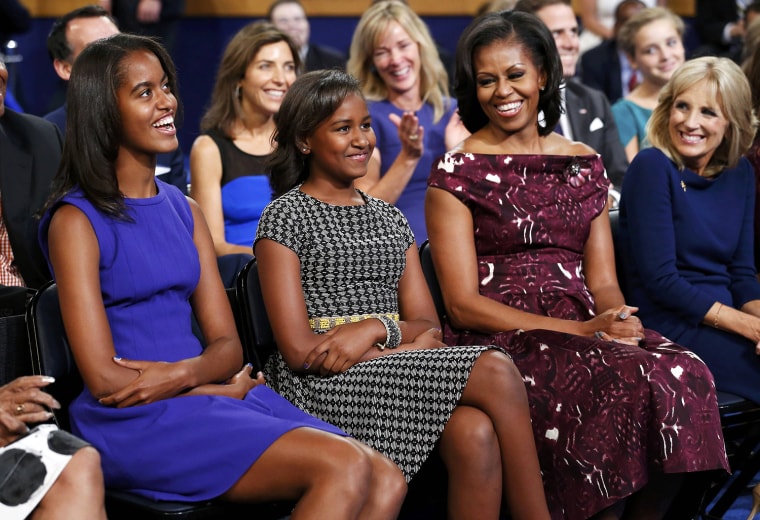 Image: The president's daughters Malia, Sasha and first lady Michelle Obama listen to U.S. President Barack Obama accept the 2012 U.S Democratic presidential nomination with Jill Biden during the final session of Democratic National Convention in Charlott