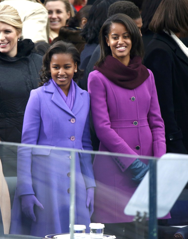 Image: The daughters of President Barack Obama, Sasha and Malia, arrive for the swearing-in ceremonies for their father on the West Front of the U.S. Capitol in Washington