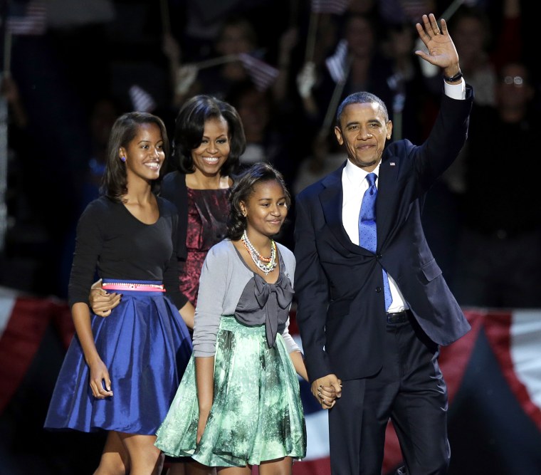Image: Barack Obama with his family after winning a second term