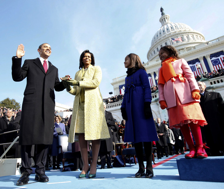 Image:  Barack Obama, left, takes the oath of office