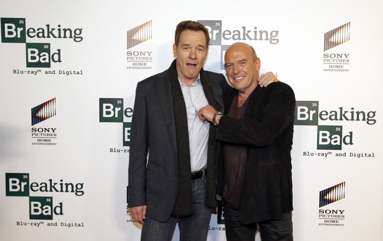 Image: Cranston and Norris pose at the premiere of \"No Half Measures: Creating the Final Season of Breaking Bad\" in Los Angeles