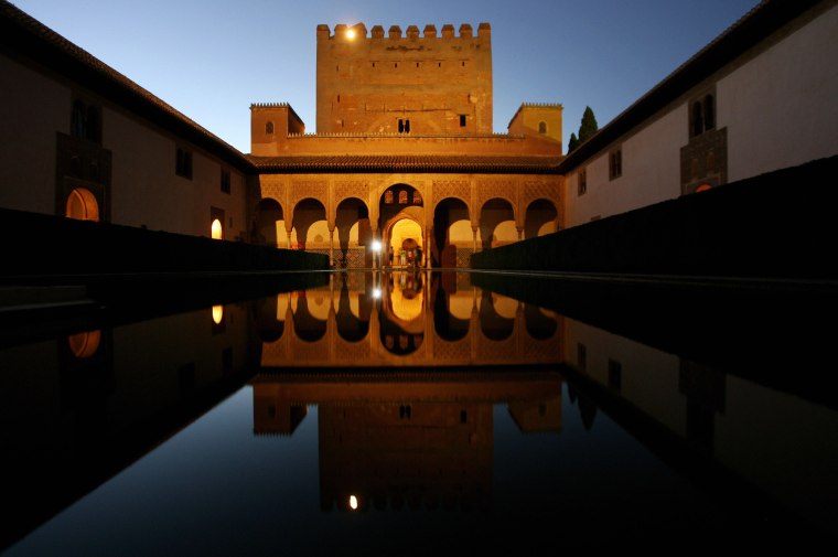 Tourist walk through the Alhambra palace