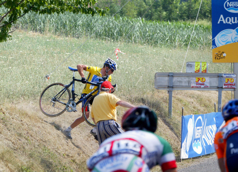 US Lance Armstrong (US Postal/USA) takes