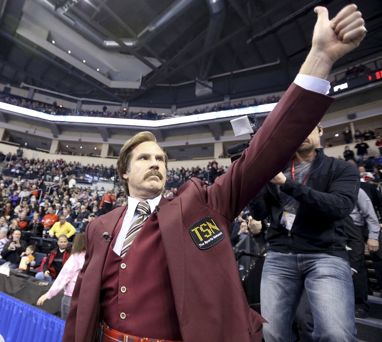 Image: Will Ferrell as Ron Burgundy salutes the crowd at the Roar of the Rings Canadian Olympic Curling Trials in Winnipeg