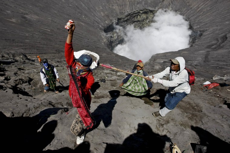 Image: Villagers Offer Up Gifts To Volcano As Part Of Yadnya Kasada Festival