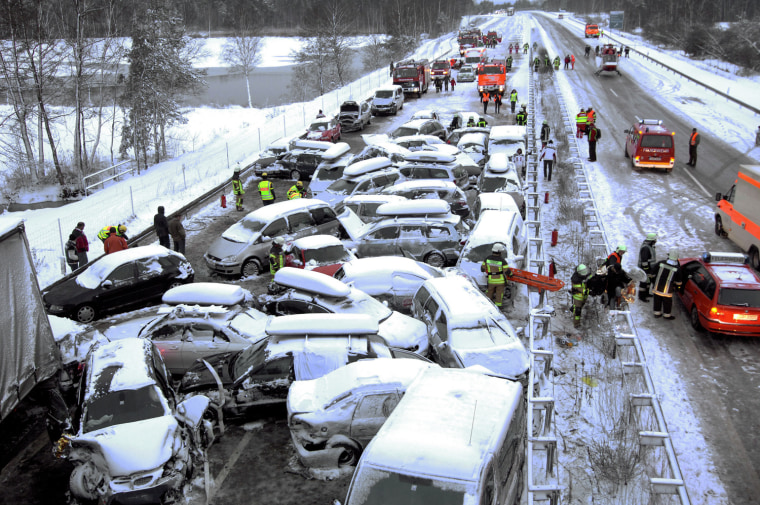 Image: A general view of a mass pile-up of cars at the Autobahn 93 freeway near Schwandorf