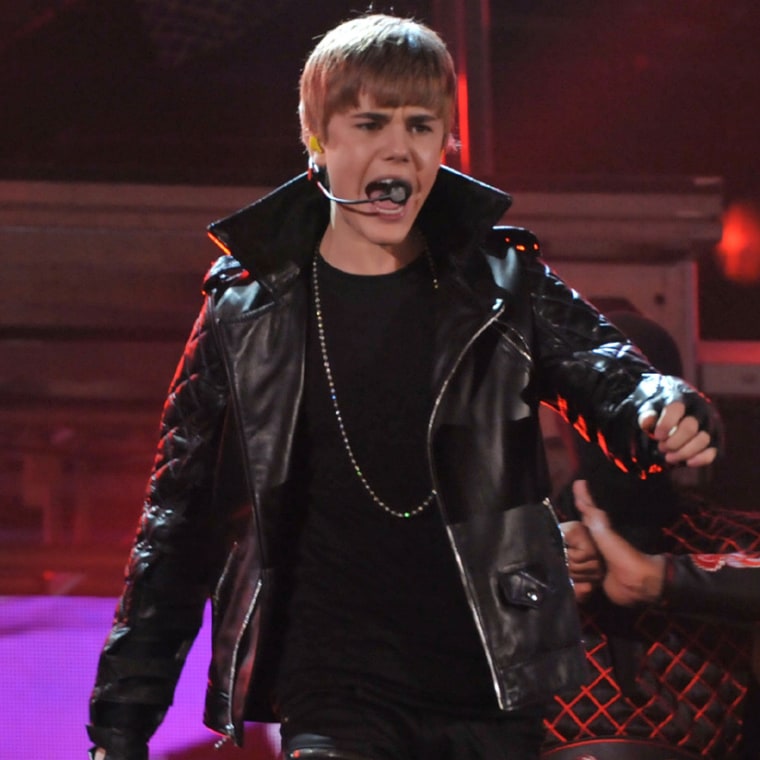 Justin Bieber, shown here performing during the 53rd Annual Grammy Awards Show, may have his ancestors' large social circles to thank for his voice.