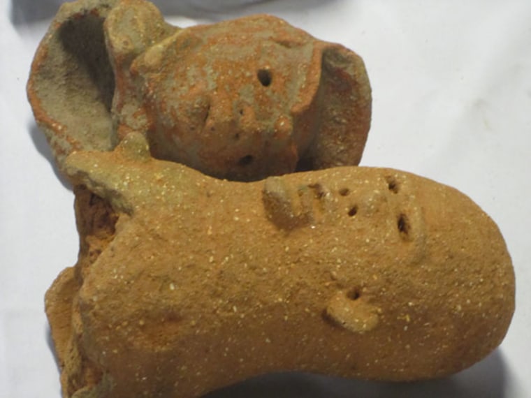 Two of the figurines American officials formally returned to the Nigerian government on Thursday. These roughly 2,000-year-old sculptures are the work of the Nok culture and were stolen from the Nigerian national museum.