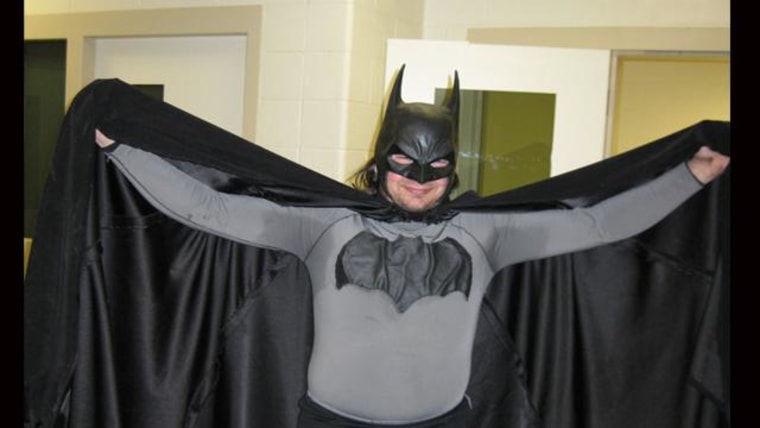 Some joker dressed as Batman arrested on roof