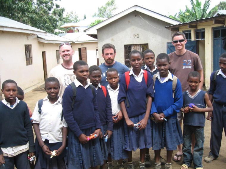 Handing out toys in an Arusha orphanage.