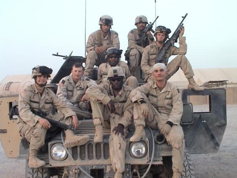 Army Spec. Nick Moore sent in this photo of himself, top left, and the rest of his platoon at Forward Operating Base Mackenzie in Iraq. "The only way things will ever move forward in Iraq is if we leave," he says.
