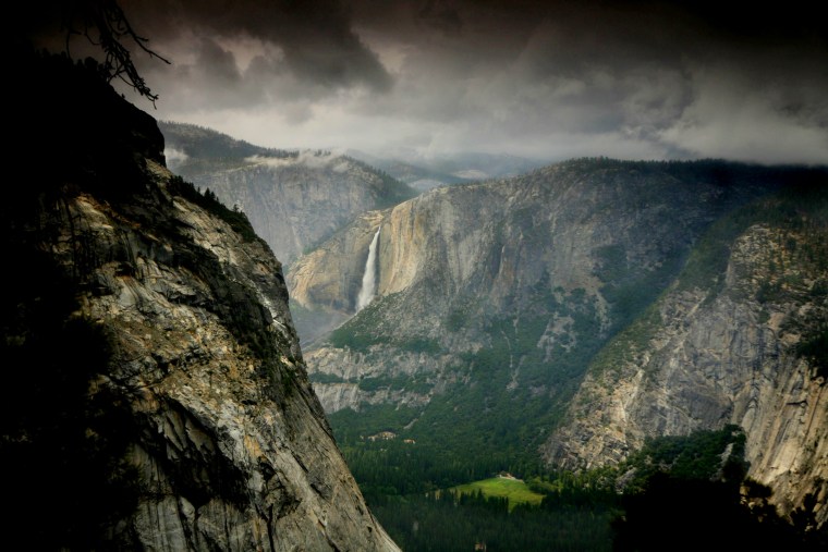 This was taken on a bizarre weather day along Glacier Point Trail looking back towards Yosemite falls.  May 2008.