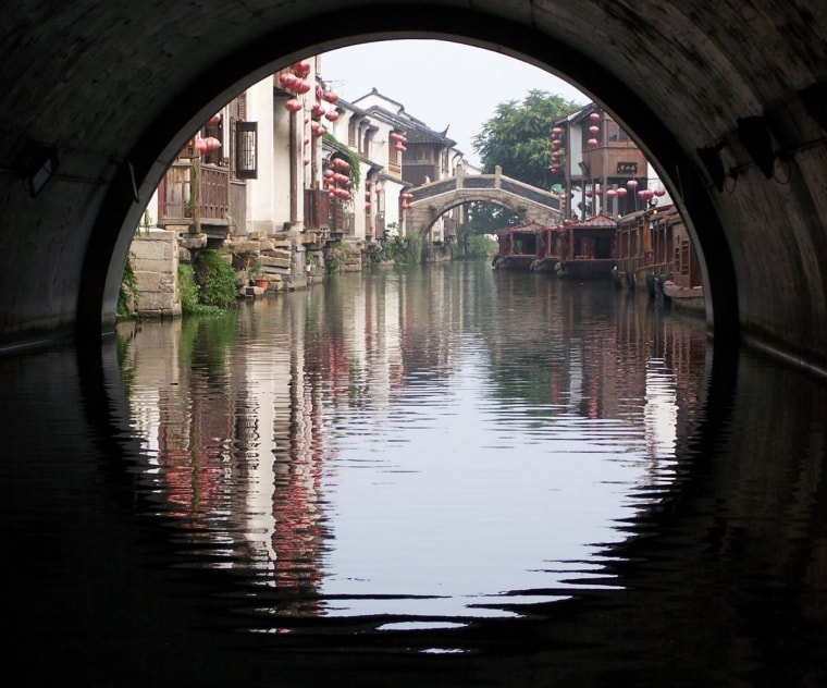 I took the picture in Suzhou, China. I like the circular shape that is made with the reflection.