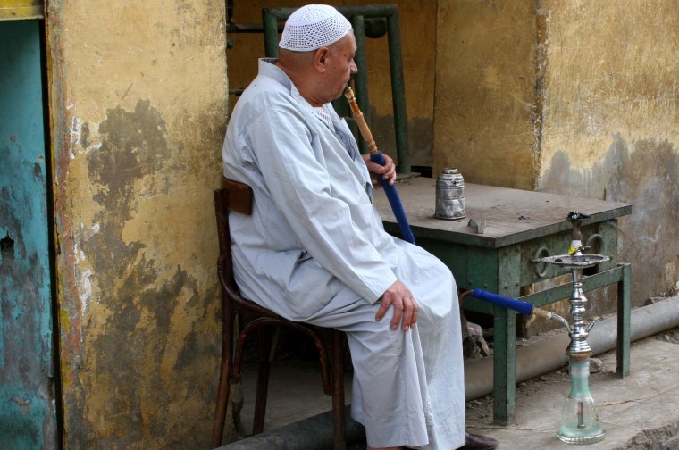 This man seems to hit all the traditional notes about life in Old Cairo.