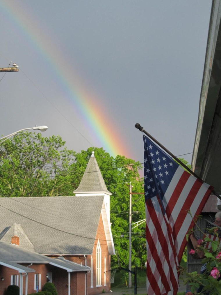 This rainbow was taken from my front porch. During a recent storm we were blessed with a double rainbow and I captured this beautiful picture.