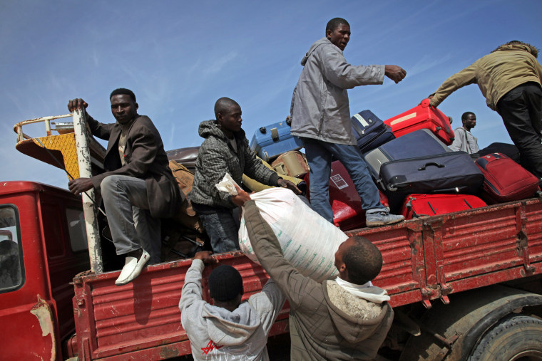 Image: Refugees Cross Tunisian Border To Escape Violence in Libya