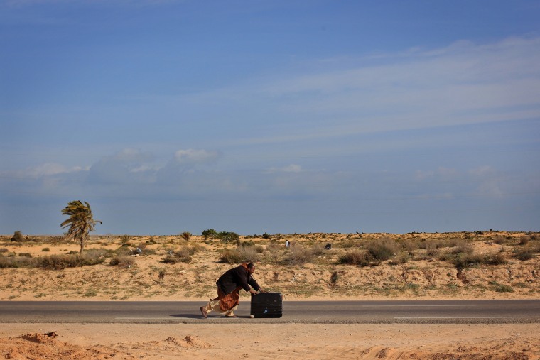 Image: Refugees Cross Tunisian Border To Escape Violence in Libya