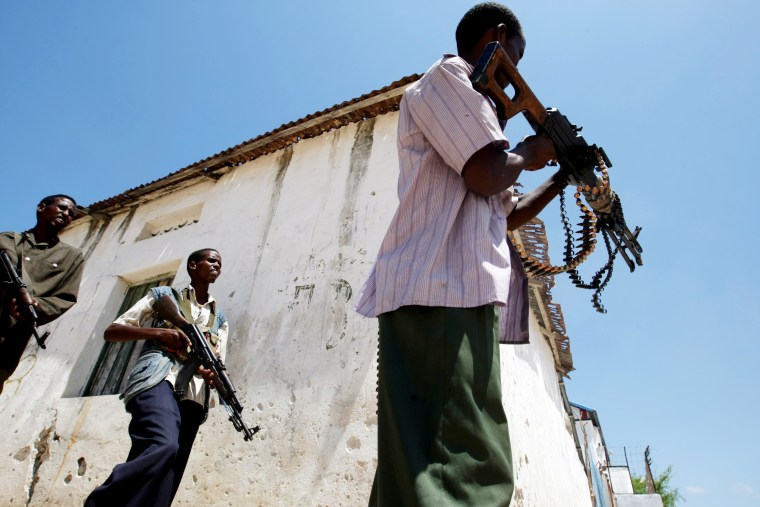Somali government soldiers engage in a shootout with Al-Shabab militants at a frontline section in Mogadishu on June 2. 